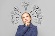 © millaf - Thinking child girl on white background with light bulb and question marks. Brainstorming and idea concept