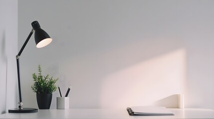 Wall Mural - A minimalist workspace with a clean desk, a single lamp, and a notebook