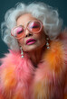 © seciltaylan - Elegant Elderly Woman in Pastel Fashion and Pink Sunglasses