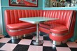 © nik_yurginson - Cozy diner booth with retro red vinyl seating and a shiny table in a vintage eatery