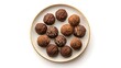 © Borasca - Assorted chocolate truffles on elegant plate with varied toppings and textures