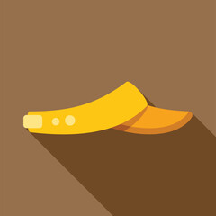 Poster - Yellow tennis cap casting a long shadow on brown background, side view