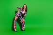 © deagreez - Full length photo of shiny attractive lady dressed colorful clothes smiling empty space isolated green color background