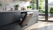 © Alex Bur - Open integrated dishwaher machine in a modern kitchen