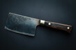 © Iurii - The cleaver displays a well-worn blade and a sturdy wooden handle, emphasizing its usage and durability