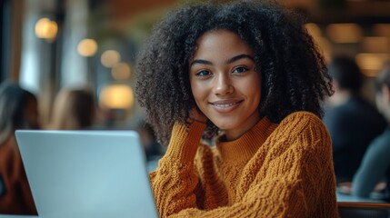 Canvas Print - Young Woman Working on Laptop in Cozy Cafe