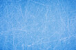 © Mariakray - Ice background with marks from skating and hockey, blue texture of rink surface with many scratches