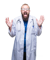 Wall Mural - Young caucasian doctor man wearing medical white coat over isolated background celebrating mad and crazy for success with arms raised and closed eyes screaming excited. Winner concept