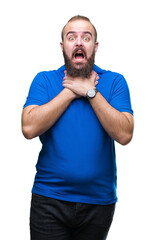 Canvas Print - Young caucasian hipster man wearing blue shirt over isolated background shouting and suffocate because painful strangle. Health problem. Asphyxiate and suicide concept.