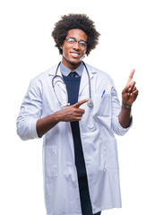 Wall Mural - afro american doctor man over isolated background smiling and looking at the camera pointing with tw