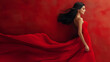 © mittpro - A woman wearing a red dress, symbolizing heart health awareness