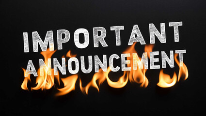 important announcement word made of fire flame on black background