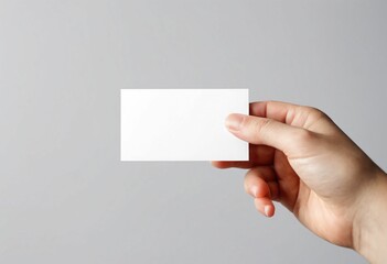 Wall Mural - Hand holding business card mockup
