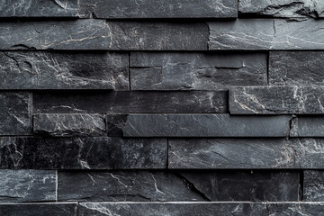 Wall Mural - Dark gray slate wall cladding background, the texture of a natural stone panel for interior or exterior decoration.