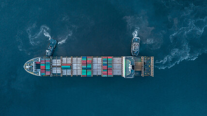 Aerial view container cargo ship  at commercial sea port, Global business logistic import export transportation international by container cargo ship, Container cargo ship freight shipping at night.