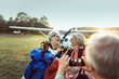 © Marko Geber - Portrait of a two happy senior women smiling after skydiving