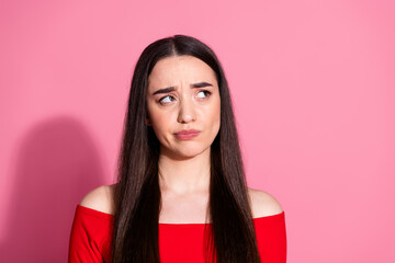 Poster - Portrait of pretty young woman look empty space red shirt isolated on pink color background