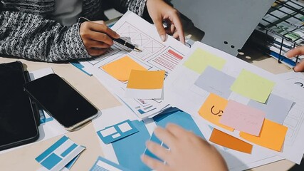 The designer team is designing the uxui system to make the uxui system work well on new phones and support system updates. Website development concept UI UX front end designer