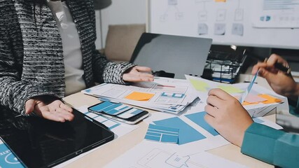 The designer team is designing the uxui system to make the uxui system work well on new phones and support system updates. Website development concept UI UX front end designer