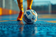 © Ala - The thrilling moment of anticipation as players gather around a colourful ball in the corner during a tense match