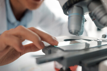 Poster - Hands, slide and science closeup for microscope, biotechnology and monkeypox vaccine development. Scientist person, healthcare and study for stem cell, genes editing or microbiome research in lab