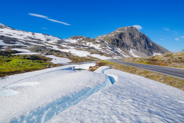 Wall Mural - nature in norway. panoramic view of wild norway. rocks and mountains. bright sunshine in the daytime