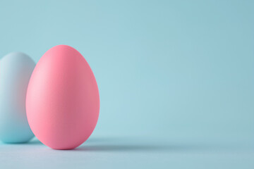 Picture the simplicity of Easter captured in a single pink egg against a solid background