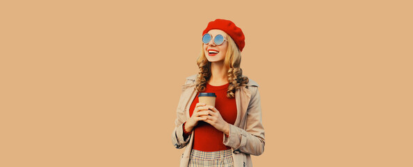 Wall Mural - Autumn fashion, portrait of beautiful happy smiling young woman, stylish girl with cup coffee drink