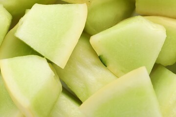 Canvas Print - Many pieces of sweet honeydew melon, closeup