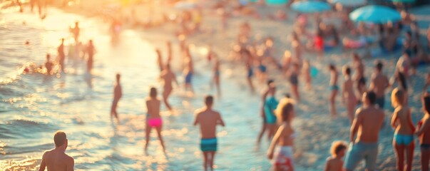 Crowd is enjoying a summer beach holiday at sunset