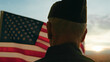 © Polonio Video - Elderly Man Stand Against American Flag For Veterans Day Holiday