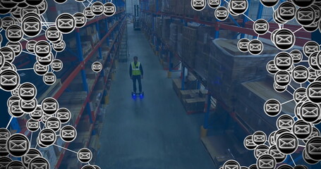 Poster - Image of envelope icons over caucasian male worker in warehouse