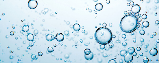 Poster - Bubbles float gracefully in sparkling water, creating mesmerizing visual effect.