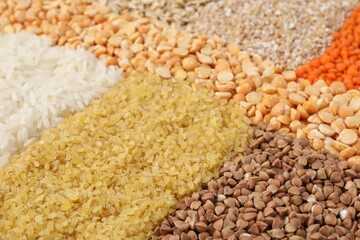 Sticker - Different types of cereals and lentils as background, closeup