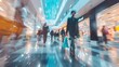 © Ameer - A blurred background of a modern shopping mall with shoppers walking, featuring motion blur and abstract shapes, capturing the dynamic activity of a busy shopping center.