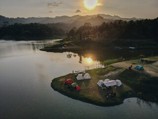 Aerial morning view of camping ground area by the Sermo Lake in Kulonprogo, Yogyakarta, Indonesia.