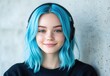 © Balaraw - young woman with blue dyed hair smiling