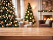 © Nyetock - Empty wood table top with abstract warm living room decor with christmas tree blur background with bokeh light,Holiday backdrop,Mock up banner for display of advertise product ,luxury house