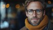 © Рудой Максим - A young man with glasses and a thick scarf poses warmly in a cozy café, highlighting the ambiance of autumn vibes and intimate gatherings