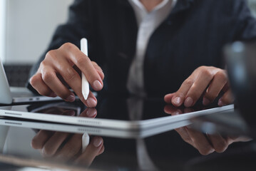 Poster - Businesswoman using digital tablet, reading e-document before signing via mobile app, proofing digital document. 