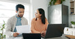 © peopleimages.com - Happy couple, paperwork and technology for investing, paying bills or estate planning. Married people, conversation and budget for insurance policy, tax returns or savings in apartment or family home