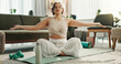 © PeakPoints/peopleimages.com - House, meditation and woman with fitness, yoga and healthy girl with routine, zen and spiritual in lounge. Apartment, yogi and person in living room, chakra and lotus for wellness, calm and training