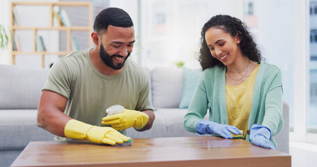 Canvas Print - Couple, spray and cleaning for table in home with smile with sponge, shine and polish in living room. Man, woman and happy for teamwork, bonding and gloves with hygiene, bacteria and wood in house