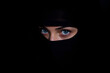 © Abdullah - Niqabi woman with beautiful blue eyes in shadow