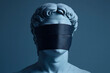 © Zay Win Htai - A Greek statue with eyes and mouth covered by tape symbolizes suppressed freedom and expression.
