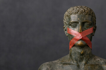 Wall Mural - A red tape crossed over mouth of Greek man, symbolizing the restriction of free speech