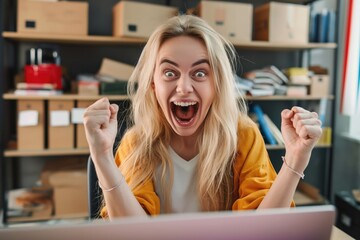 young blonde woman celebrating business success with open eyes. ecommerce entrepreneur screams excit