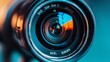 © Zoe Damaris - Close-up of a camera lens with a blue and orange color filter.