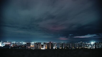 Wall Mural - Time lapse of city before the storm at night