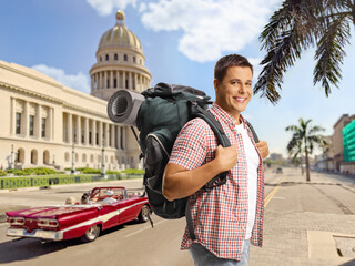 Wall Mural - Male backpacker walking in Havana